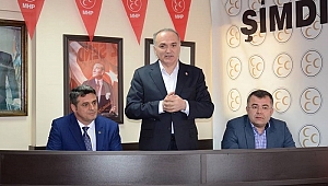 BAKAN ÖZLÜ'DEN MHP'YE ZİYARET