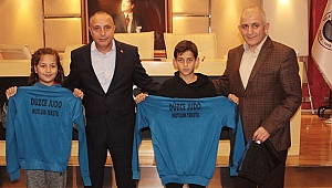 MUTLU KAYAN'DAN MİNİK SPORCULARA DESTEK
