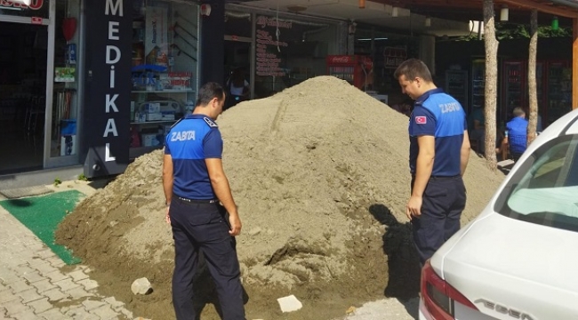 KALDIRIMA KUM DÖKEN İŞYERİNE CEZA