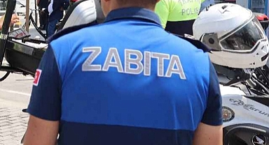 SEYYAR SATICIYLA KAVGA EDEN ZABITA MEMURU AÇIĞA ALINDI